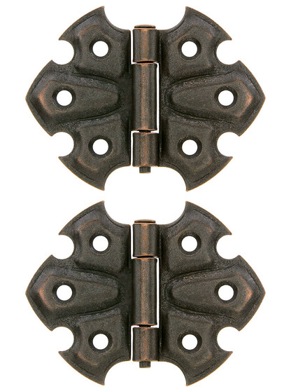 Pair of Ornamental Flush Mount Cabinet Hinges - 1 7/8 inch H x 2 1/2 inch W in Antique Copper.